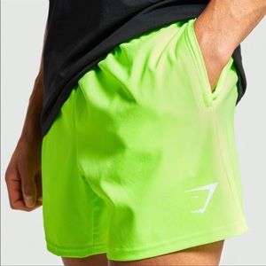 Gymshark 5 inch Arrival Lime Green shorts.